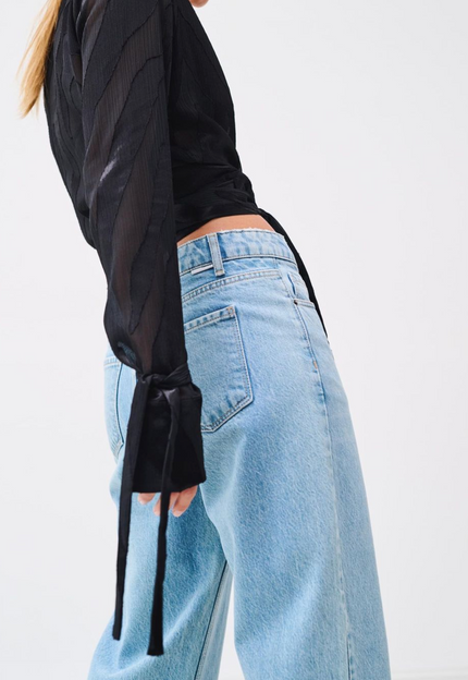 <strong>EDGY DENIM</strong> - low waist fit. Coming back soon, but what's underneath it?
